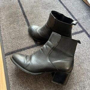 Chic Black Leather Heeled Boots